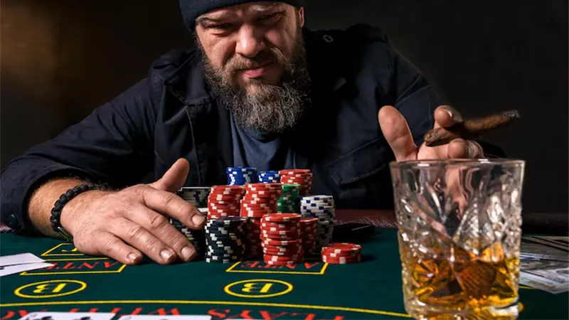 Group of professional poker players seated around a casino table, intently studying each other's facial expressions and body language
